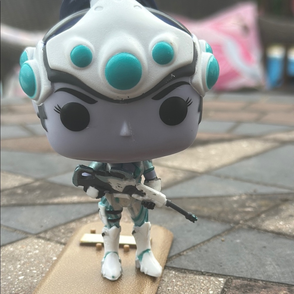 Funko Pop Figure with Turquoise and White Armor Widowmaker